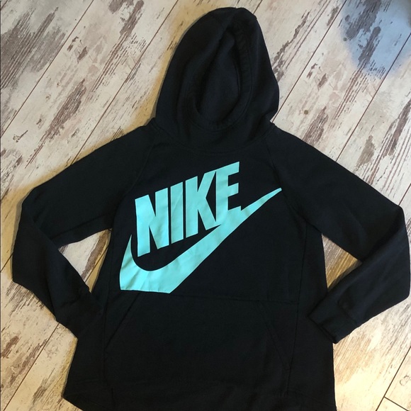 black and turquoise nike shirt